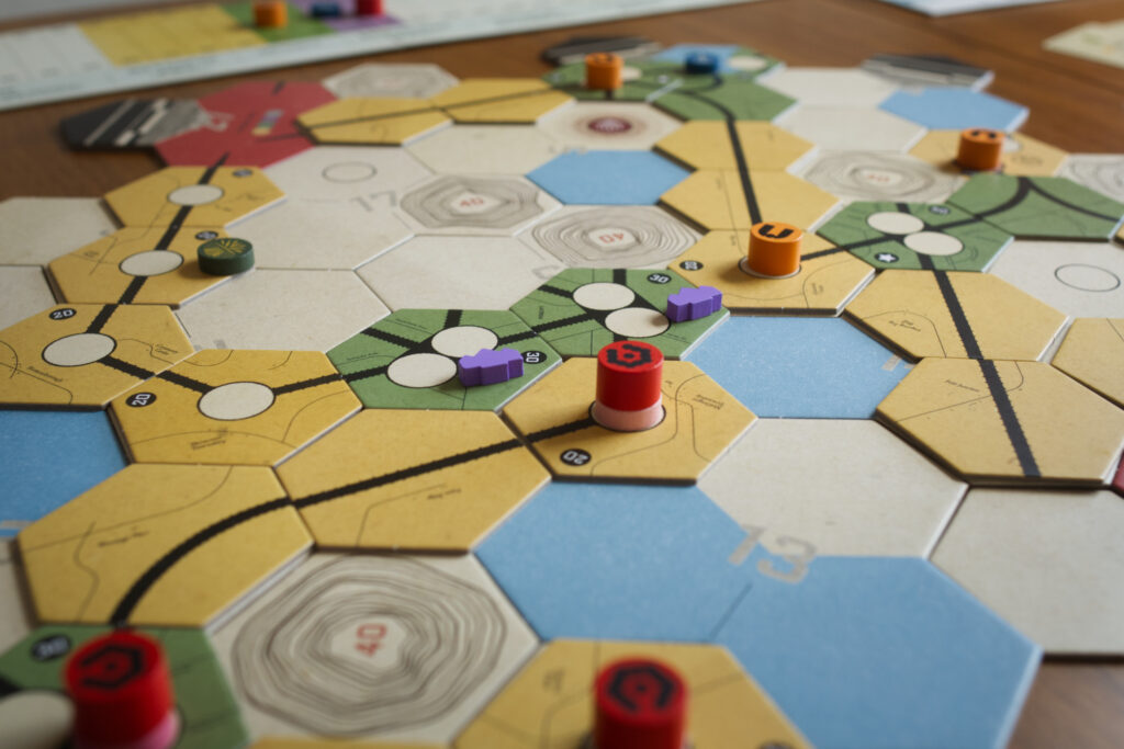 Part of the map from board game Railways of the Lost Atlas with various company hubs.