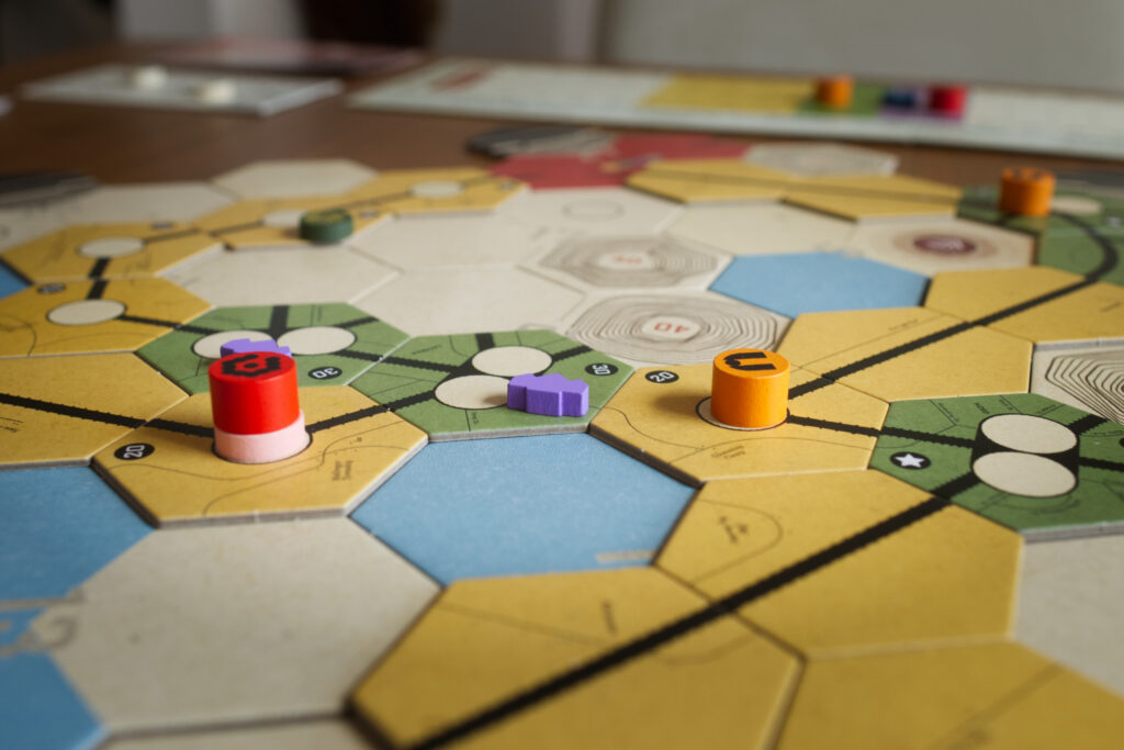 Part of the map in board game Railways of the Lost Atlas, with some major company markers