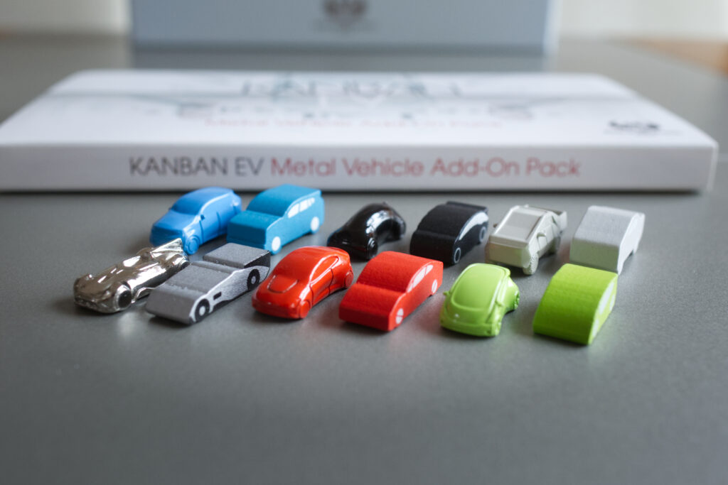 Metal and wooden cars for board game Kanban EV