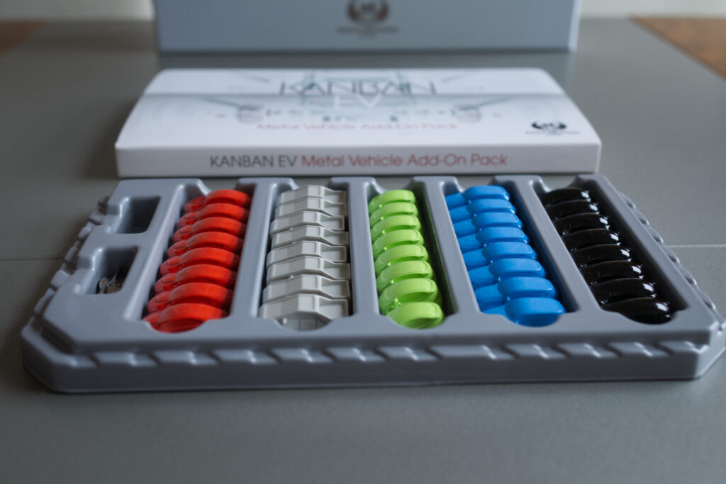 Metal cars in tray for Kanban EV